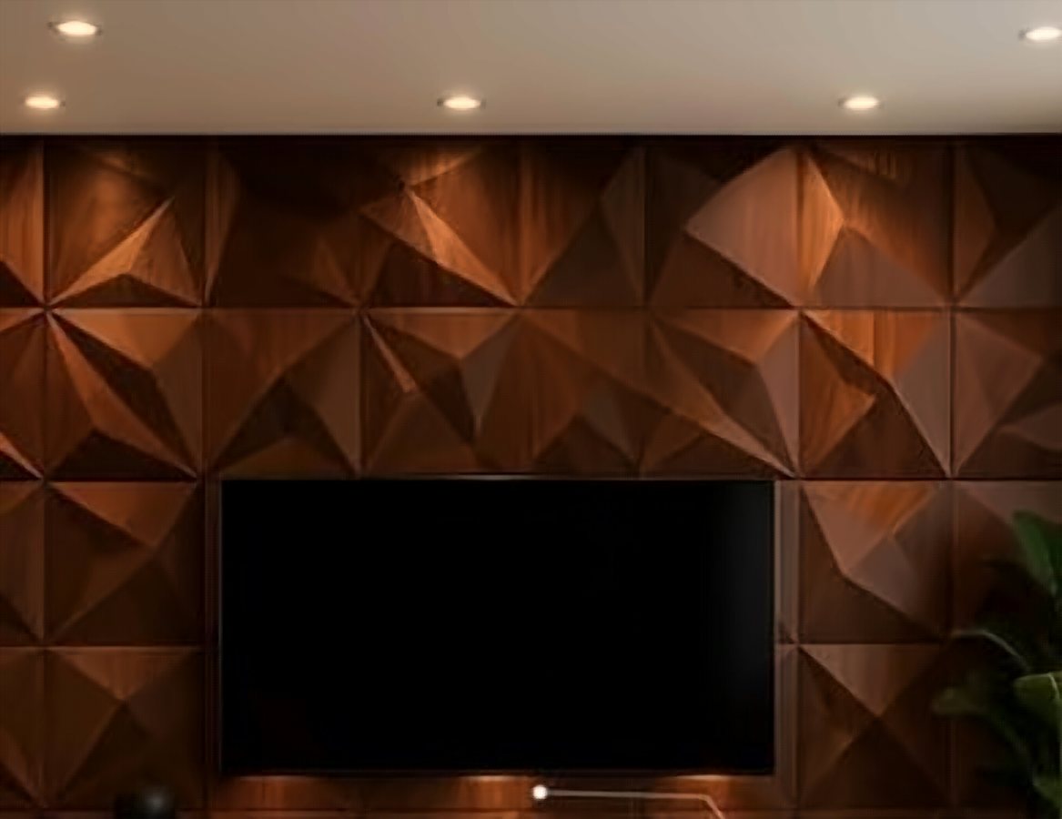 Pared con paneles 3D detrás de televisor